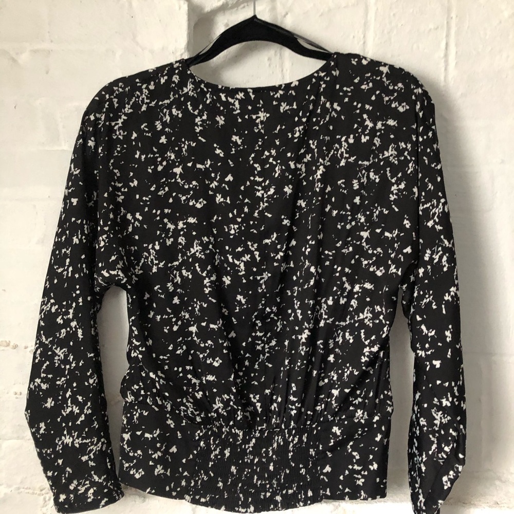 Jennifer Lopez blose with banded bottom